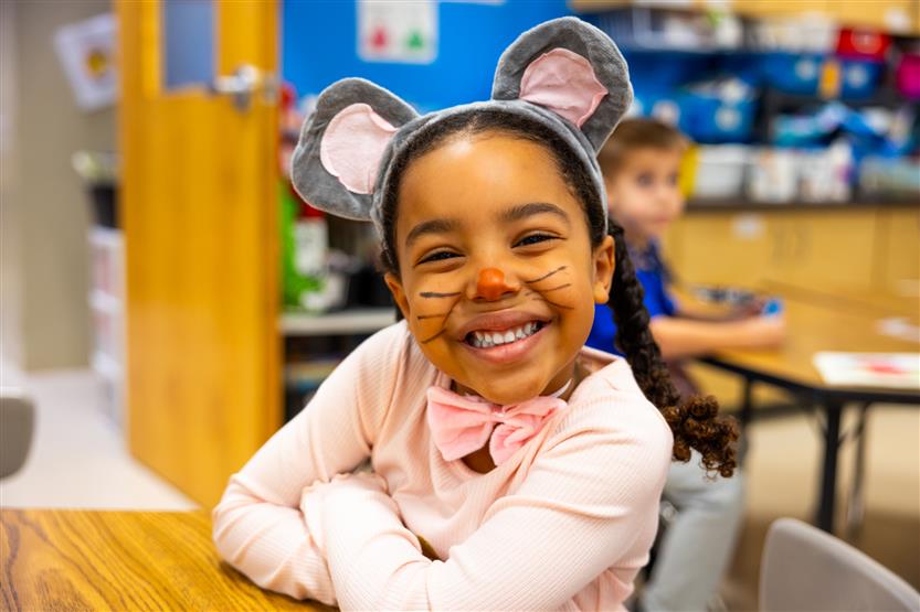 Students participate in an alphabet parade